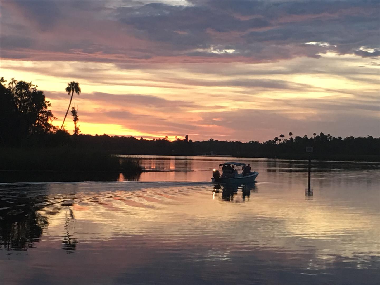 Boat at Sunset at the Shallows, Kings Bay,  Crystal River, FL