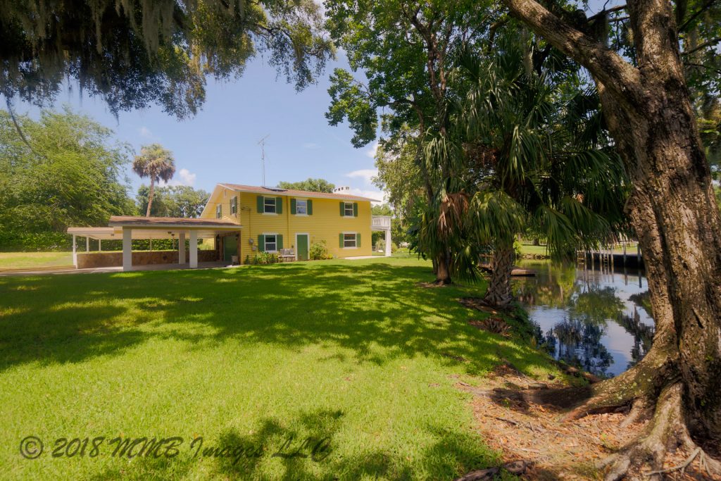 Listing Photo for the Real Estate and Riverfront Home for Sale in Inglis, Citrus County at 11565 N Caribee Pt