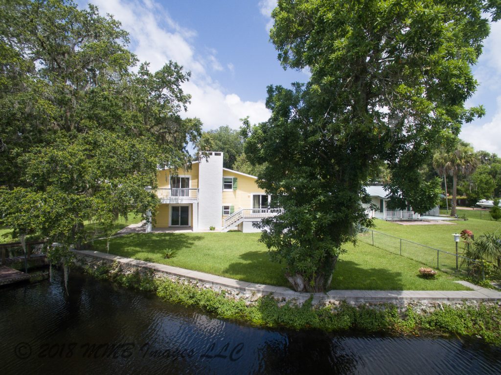 Listing Photo for the Real Estate and Riverfront Home for Sale in Inglis, Citrus County at 11565 N Caribee Pt