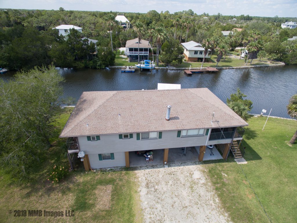 Real Estate Listing Photo for the Real Estate Home for Sale at the Gulf of Mexico in 'Woods N Waters' on 12055 W Bald Eagle Ct., Crystal River, Citrus County, FL 34428