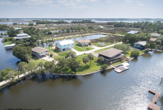 Real Estate Listing Photo for the Real Estate Home for Sale at the Gulf of Mexico in 'Woods N Waters' on 12055 W Bald Eagle Ct., Crystal River, Citrus County, FL 34428