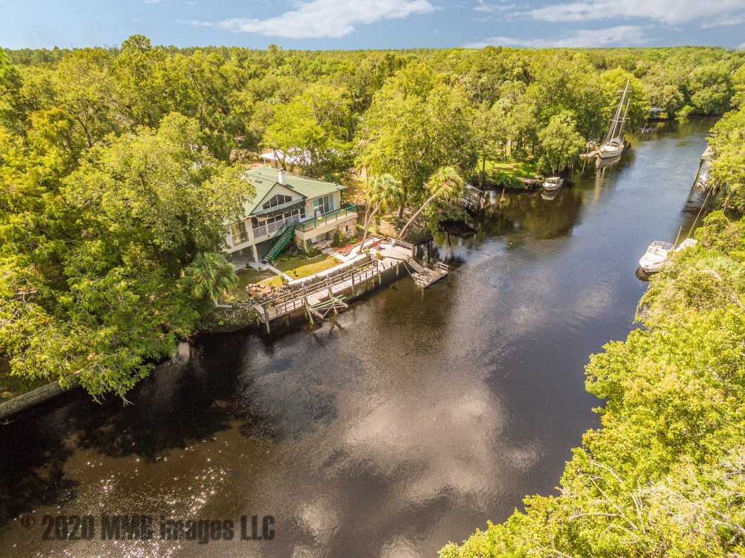 Real Estate Listing Photo for the Waterfront/Riverfront Real Estate Home for Sale on 14131 W River Rd. in Inglis on the Withlacoochee River, Citrus County, FL 34449